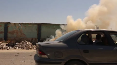 Open Garbage Burning Causes Air Pollution and Environmental Harm in Urban Areas Stock Footage 347515335