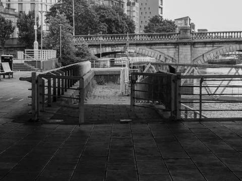The open gate leading to a secure metal pontoon. Stock Photos