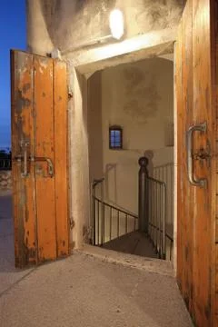 Open gate of the lighthouse tower on the Adriatic coast. Stock Photos