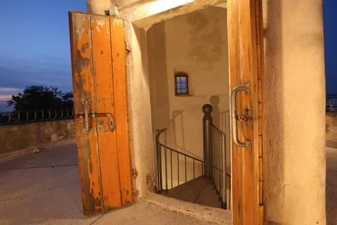 Open gate of the lighthouse tower on the Adriatic coast. Stock Photos