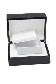 Open gift box inside a black hard case Stock Photos