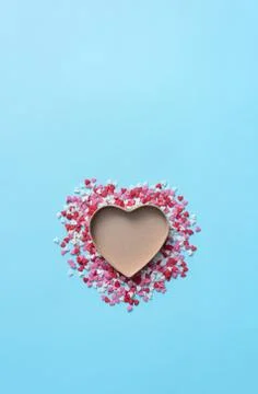 Open gift box with tiny hearts around it Stock Photos