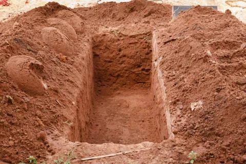 Open grave Stock Photos