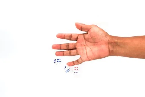 Open Hand Reaching For White Dice With Blue Numbers Isolated On White Backg.. Stock Photos