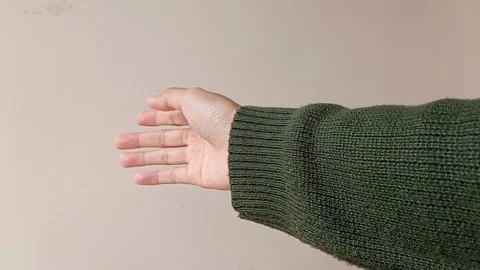 An open up hand trying to hold another hand Stock Footage 150599292