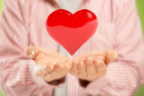 Open hands with heart Stock Photos