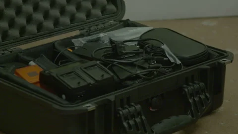 Open hard case with video equipment and accessories Vídeos de archivo 341863042