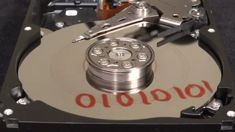 Open hard drive, close-up view, rotation stopped on word 01010101 - C0009 Stock Footage 320838380