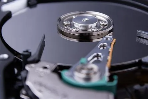 Open hard drive computer closeup. Detail of a computer. Stock Photos