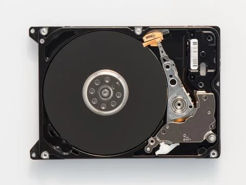 Open Hard Drive With exposed Disk And Writing Head. 库存照片