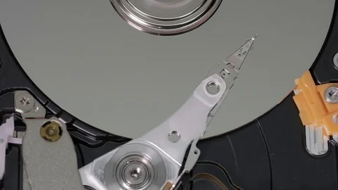 Open hard drive work and read data. Top angle shot . Half disk visible Stock Footage 74118392