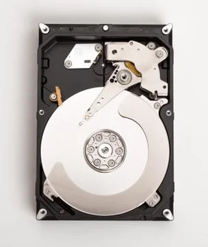 Open harddisk on desk. Stock Photos