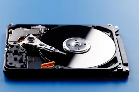 Open HDD on a blue background 写真素材