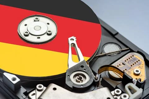 Open HDD hard disk drive with a flag of Germany symbol on it, German data i.. Stock Photos