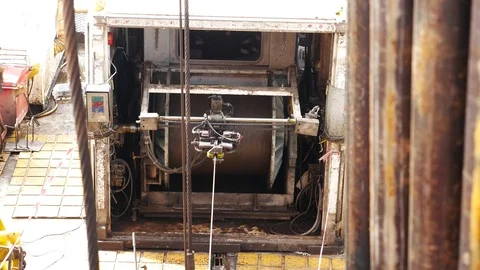 Open hole wireline logging unit running in an oil well Stock Footage 71098987