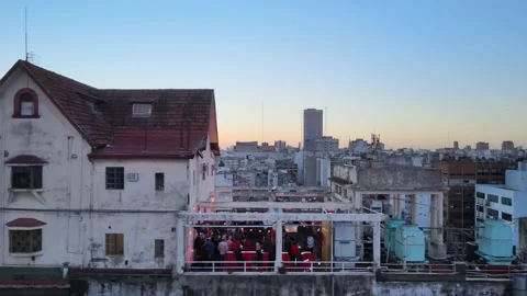Open house event function on the rooftop terrace next to little chalet Stock Footage 166874417