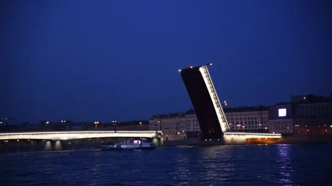 Open illuminated Liteyny bascule bridge at night Stock Footage 248719447