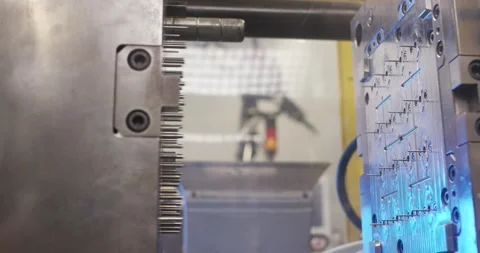Open Injection Mold Ejecting White Parts, Plastics Machine, Wide Shot Stock Footage 340658995
