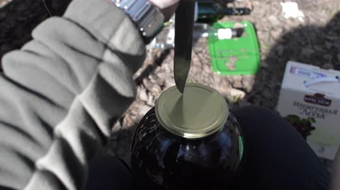 Open Jar With Compote on a Picnic Stock Footage 62416112