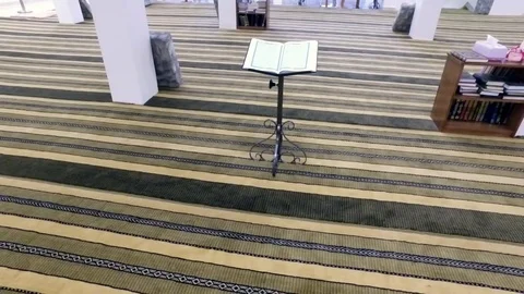 An open Koran in an Arab mosque on an iron stand. Stock Footage 76570257