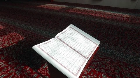 Open the Koran in the Mosque on the Table. Are visible Ayyats. 5 Stock Footage 76246457