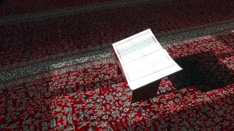 Open the Koran in the Mosque on the Table. Are visible Ayyats. 2 Stock Footage 76246533