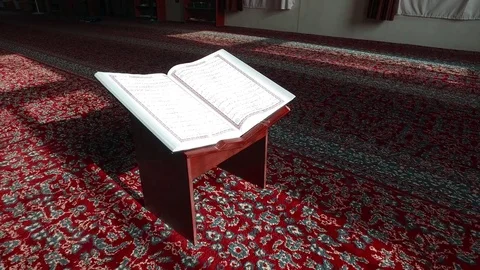 Open the Koran in the Mosque on the Table. Are visible Ayyats. 6 Video stock 76246630