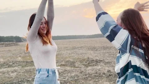 Open landscape and joyous movement, telling a story through dance, smiles Stock Footage 312235342
