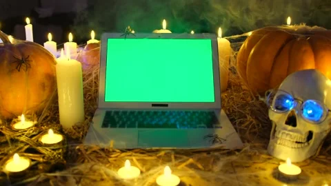 Open laptop with chromakey and attributes in fog spirit night, background Stock-Footage 250519030