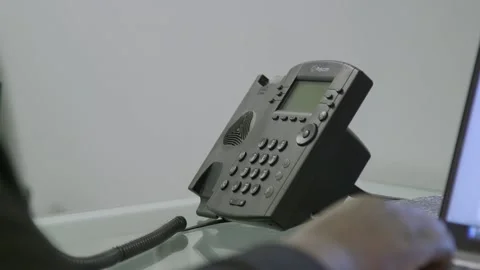 An open laptop computer sitting on top of a desk Stock Footage 155537330