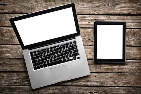 Open laptop with digital tablet Stock Photos