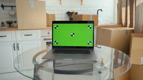 Open laptop ready for online work in kitchen of apartment Stock Footage 201185089