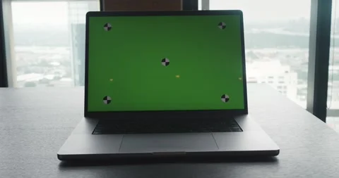 Open laptop screen copyspace on table, cityscape through window. technology Stock Footage 267366438