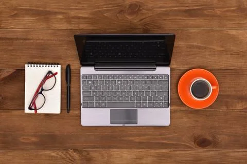 Open laptop on table Stock Photos