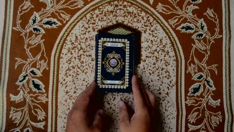 Open the litle quran Stock Footage 119736559