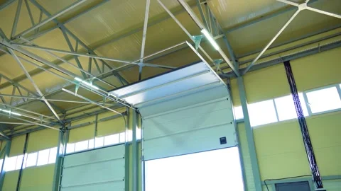 Open Loading Dock Door Inside Modern Warehouse With Steel Roof Structure Stock Footage 340041848