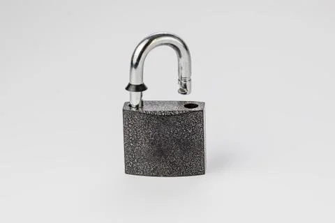 Open lock on grey background isolate Stock Photos
