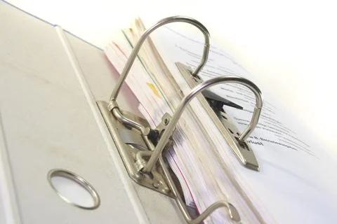 Open lying file folder in front of a white background Stock Photos