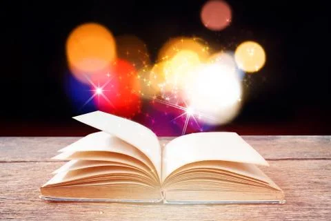 Open magic book  for science and education or religion concept Stock Photos