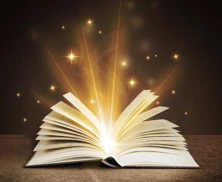 Open magical book Stock Photos