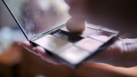 Open makeup palette with brush in soft natural light Video stock 336467528