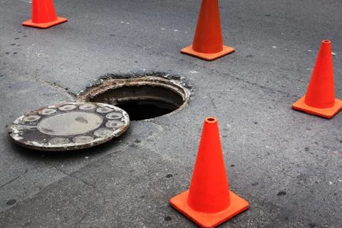 Open manhole Stock Photos