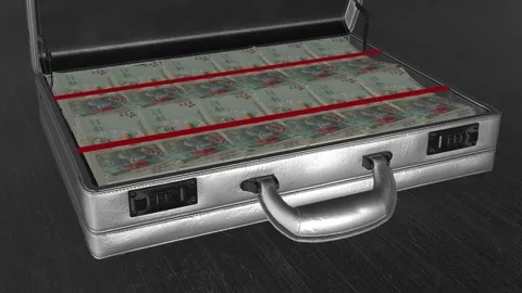 Open metallic briefcase filled with stacks of Kuwait 1 Dinar banknotes Stock Footage 318899952