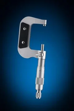 Open micrometer side view isolated on blue background Foto stock