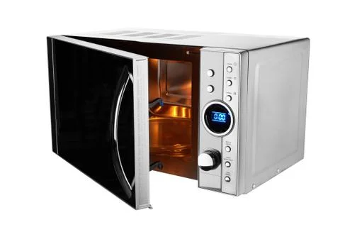 Open microwave oven Stock Photos