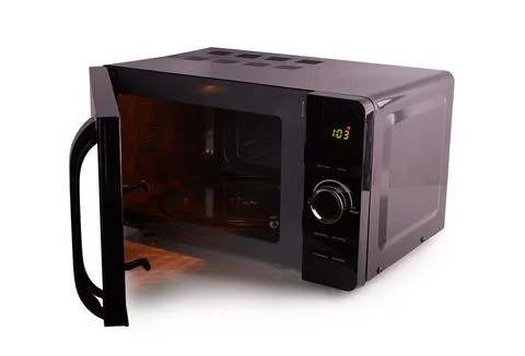 Open microwave oven Stock Photos