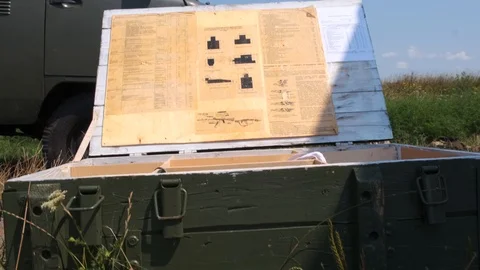 Open military box inside the shooting range device Stock-Footage 118375823
