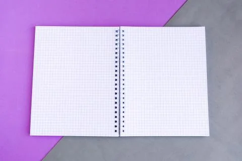 Open mockup notepad on color background, copy space for the text Stock Photos