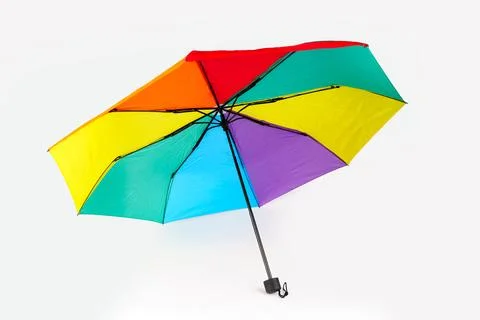 Open Multi-Colored Rainbow Umbrella Isolated on White Background Stock Photos