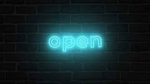 Open neon text animation on wall background. Seamless looping video Stock Footage 292914969